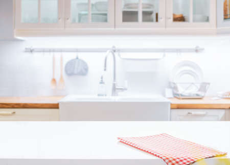 Wood table top on blurred kitchen backgroundの写真素材