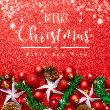 Christmas and New Year typographical on red background with Red glitter textureの写真素材