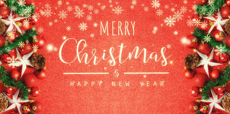 Christmas and New Year typographical on red background with Red glitter textureの写真素材