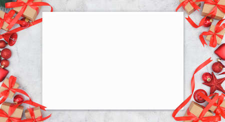 Creative New Year or Christmas greetings letter mockup flat lay top view Xmas holiday celebration envelope on white paper background golden glitter. Template mock up greeting card text design 20121  decorationの写真素材