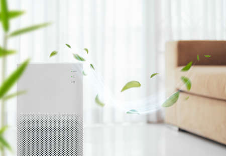 Air purifier on blue background with filter for cleaner removing fine dust PM2.5の写真素材