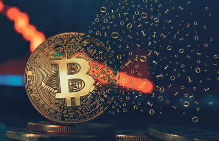Crypto currency golden coin. Gold bitcoin falling apart. Concept of a cryptocurrency market crisis...