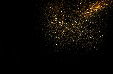glitter vintage lights background. gold and black. de focusedの写真素材