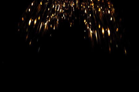 glitter vintage lights background. gold and black. de focusedの写真素材