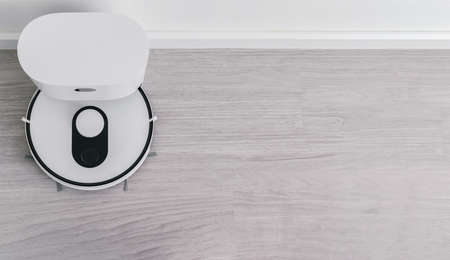 robotic vacuum cleaner on wood floor smart cleaning technologyの写真素材