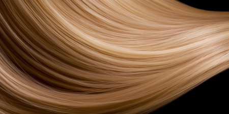Curly blond hair close-up isolated on backの写真素材