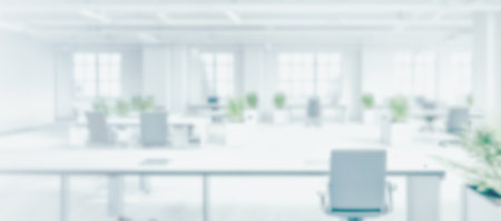 Blurred empty open space office. Abstract light bokeh at office interior background for design.generative aiの素材