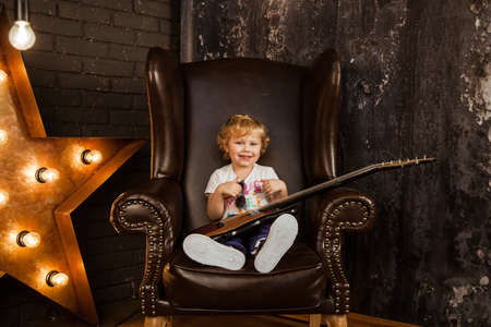 Rock girl with guitarの写真素材