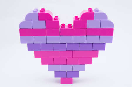 Heart shape made from colorful construction blocksの写真素材