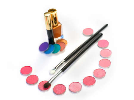 Stil life with eye shadows and make-up brushes on whiteの写真素材