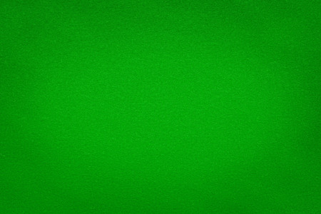 Green decorative paper close-up. Paper background or textureの写真素材