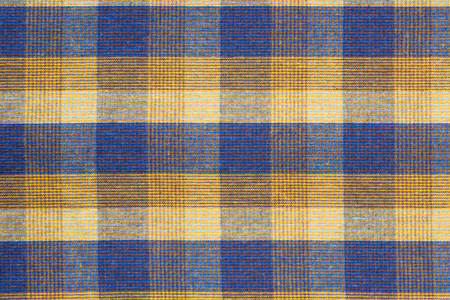Blue and yellow plaid fabric close up. Background and textureの写真素材