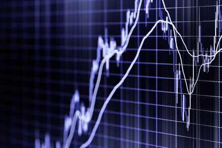 Stock market graph. Toned blurred image with diminishing perspective and selective focusの写真素材