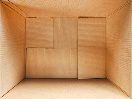 Cardboard box interior. Wide angle detailed top view