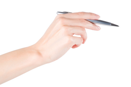Woman hand with pen. Isolated on white, clipping path includedの写真素材