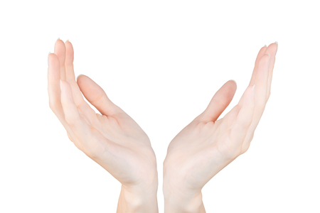 Two woman hands holding or protecting something. Isolated on white, clipping path includedの写真素材
