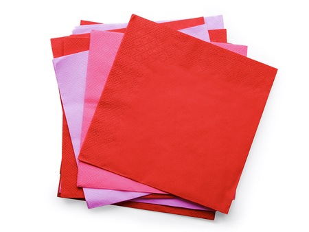Colored paper napkins heap top view. Isolated on whiteの写真素材