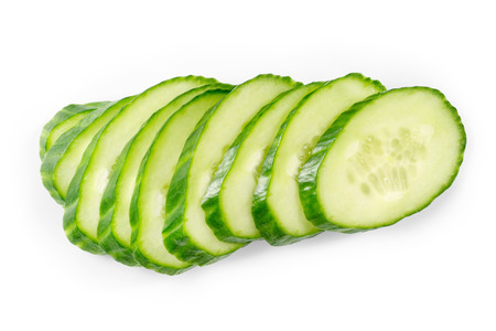Green cucumber slices isolated on whiteの写真素材