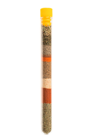 Glass vial of spices isolated on white, clipping path includedの写真素材