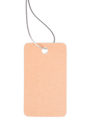 Blank brown craft cardboard tag with copy space with silver rope. Isolated on whiteの写真素材