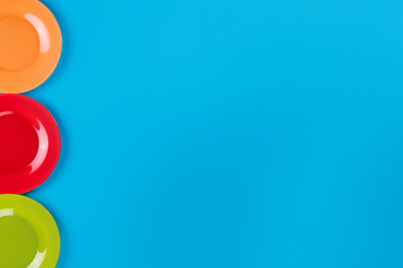 Blue surface with colored plates. Template and backgroundの写真素材