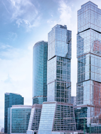 Moscow International Business Center (Moscow City). Moscow, Russia. Blue toned downtown skyscrapers against cloudy skyの写真素材