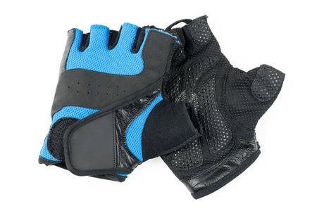 Blue and black cycling or fitness gloves isolated on white backgroundの写真素材
