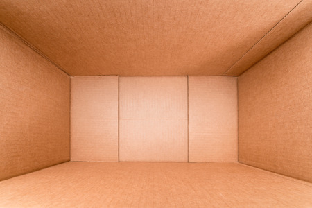 Wide angle view inside large rough cardboard boxの写真素材