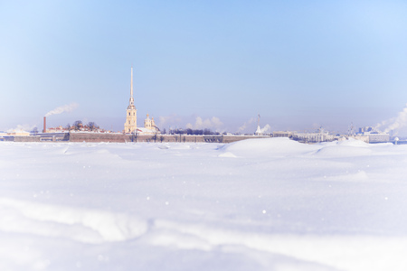 Winter high key landscape of Saint Petersburg, Russia. Peter and Paul fortress view from frozen Neva riverの写真素材