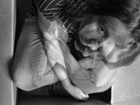Girl in the box. Depression, anxiety, split personality and dark mood theme. Black and white multi...