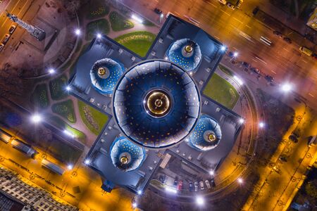 Illuminated dome of Trinity Cathedral in Saint Petersburg, Russia. Top aerial view at nightの写真素材