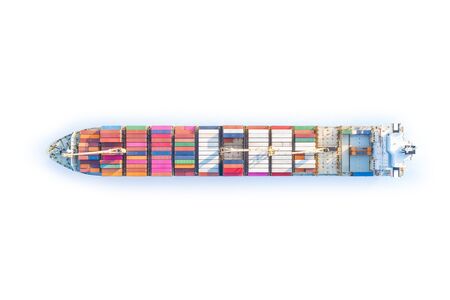 Large full loaded container ship sailing bright blue sea. Top view isolated on white, clipping path...