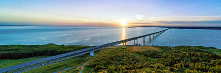Sunrise over Volga river and long President bridge in Ulyanovsk, Russia. Aerial viewの写真素材