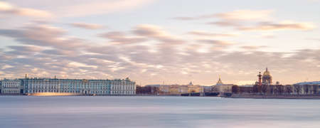 Neva river embankment at summer sunrise panoramic landscape in Saint Petersburg, Russia. Hermitage, st Isaac cathedral, Rostral column and Palace bridgeの写真素材