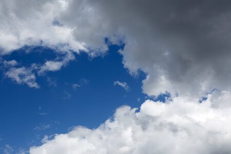 Blue sky background with clouds view. Nature photo. 