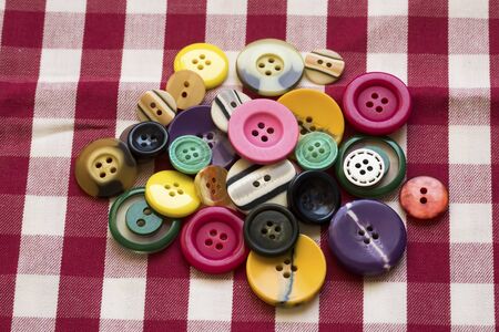 Sewing buttons background. Colorful sewing buttons texture