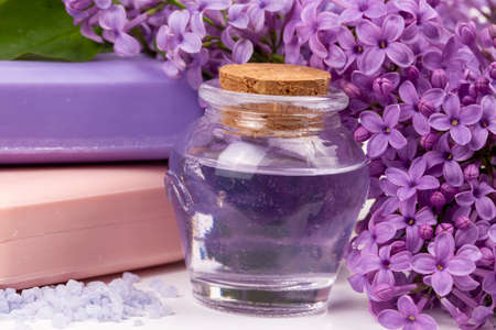 Lilac nature cosmetics, handmade preparation of essential oils, perfume, creams, soaps from fresh and lilac flowersの写真素材