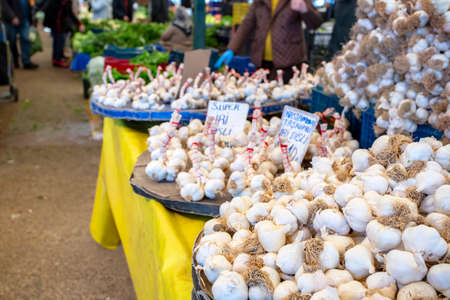 Bostanli / Izmir / Turkey, February 20, 2019, Bostanli bazaar, garlic marketのeditorial素材