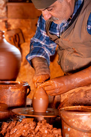 Menemen / Izmir / Turkey, October 20, 2018, Menemen, Izmir Pottery masters working in traditional pottery workshopのeditorial素材