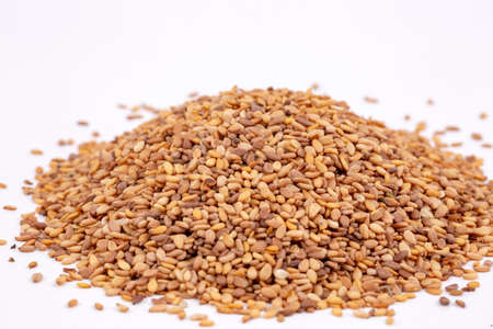 Sesame seeds isolated on white background top view