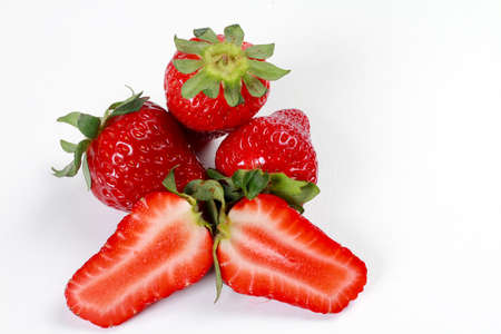 Fresh organic strawberry fruits on the white background