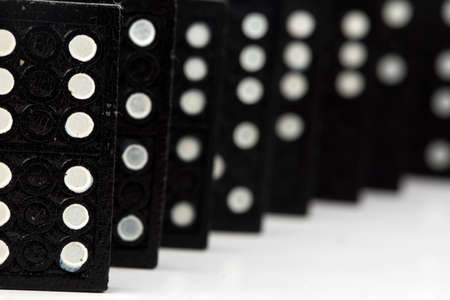 Falling dominoes. Domino effect. The domino game.の写真素材