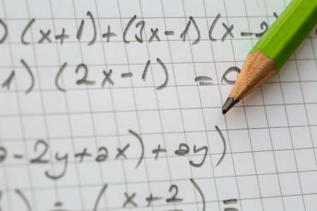 Close-up of Hand written Mathematical Formulas. Concept of Education
