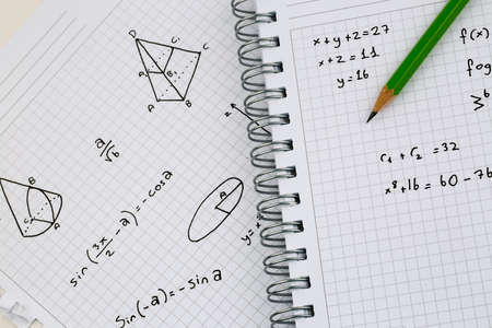 Close-up of Hand written Mathematical Formulas. Concept of Education