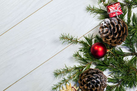 Christmas or New Year dark wooden background, Xmas black board framed with season decorations, space...