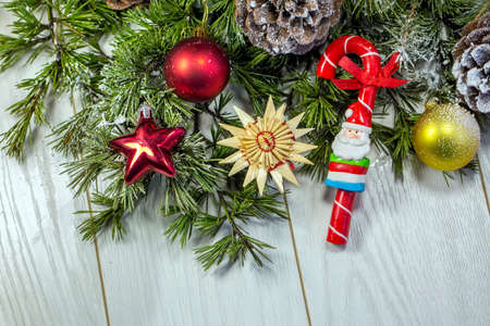 Christmas or New Year dark wooden background, Xmas black board framed with season decorations, space for a text, view from aboveの写真素材