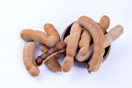 Dried tamarind fruits isolated on a white backgroundの写真素材