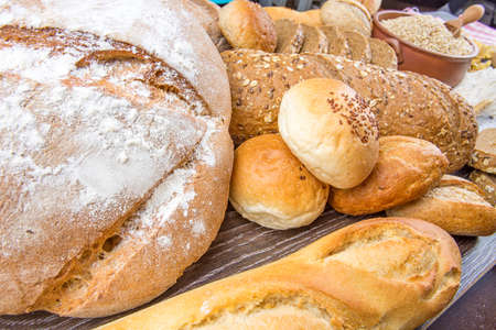 Assorted breads isolated on a white background.