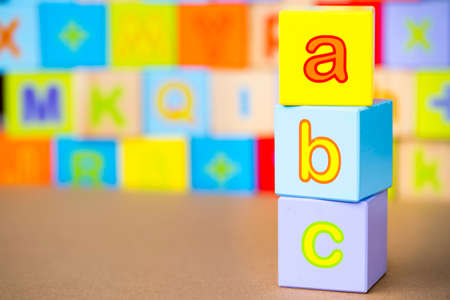 Wooden alphabet on the white background. Concept photo.の写真素材