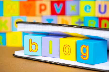 Wooden alphabet on the white background. Concept photo.の写真素材